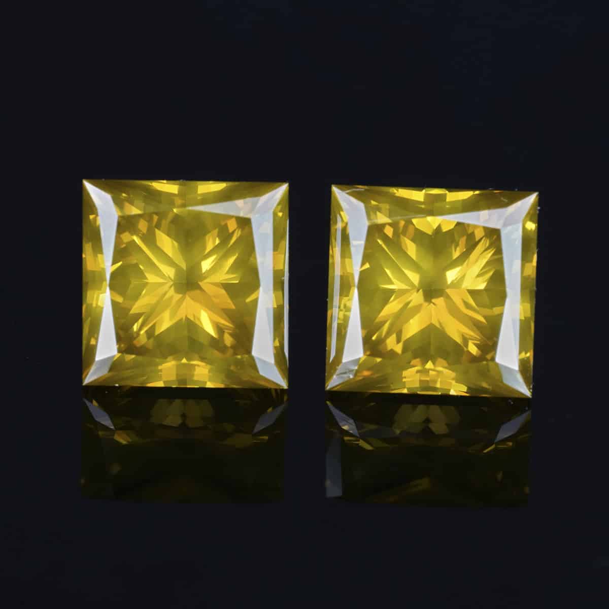 4.02CT 6.72mm Intense Yellow Diamond Pair