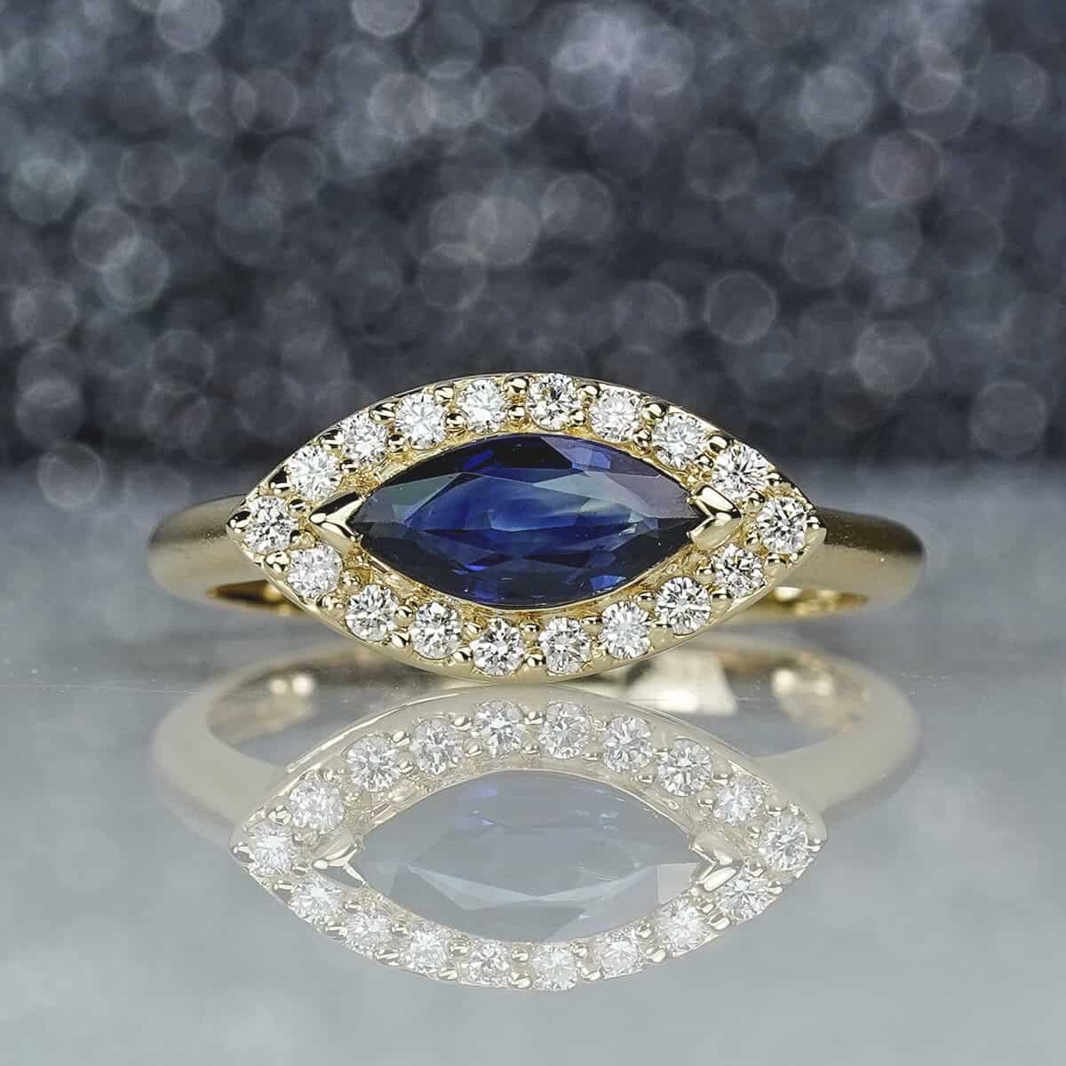 1.11CT Blue Sapphire Marquise East - West & Diamond Ring